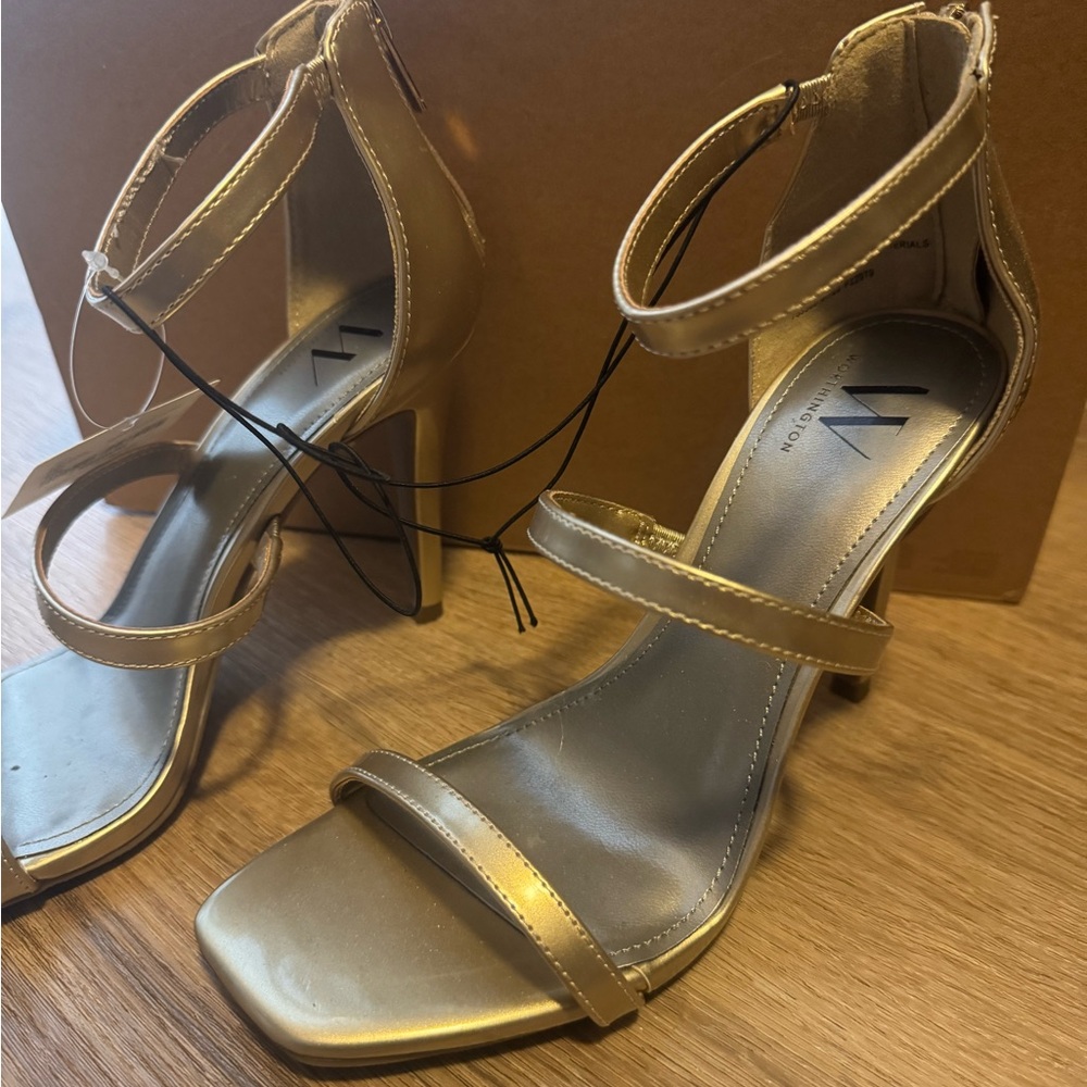 Strapped gold heels